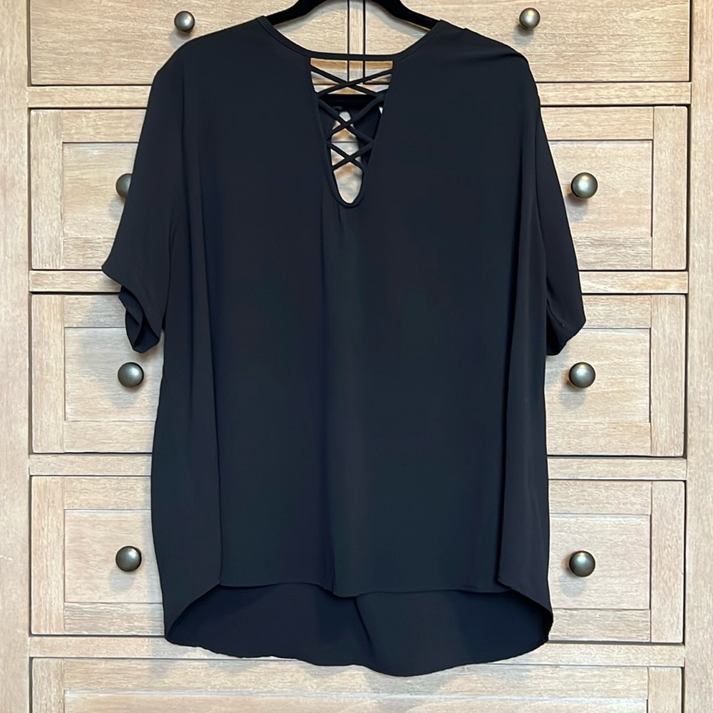 Black top with cutout detail and small keyhole back